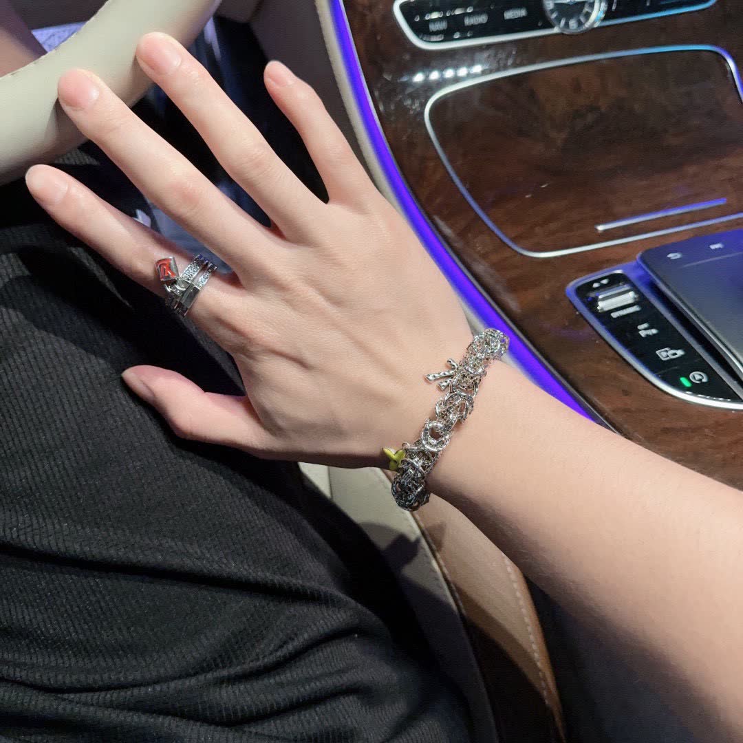 Louis Vuitton Silver Bracelet with Yellow Flower Charm